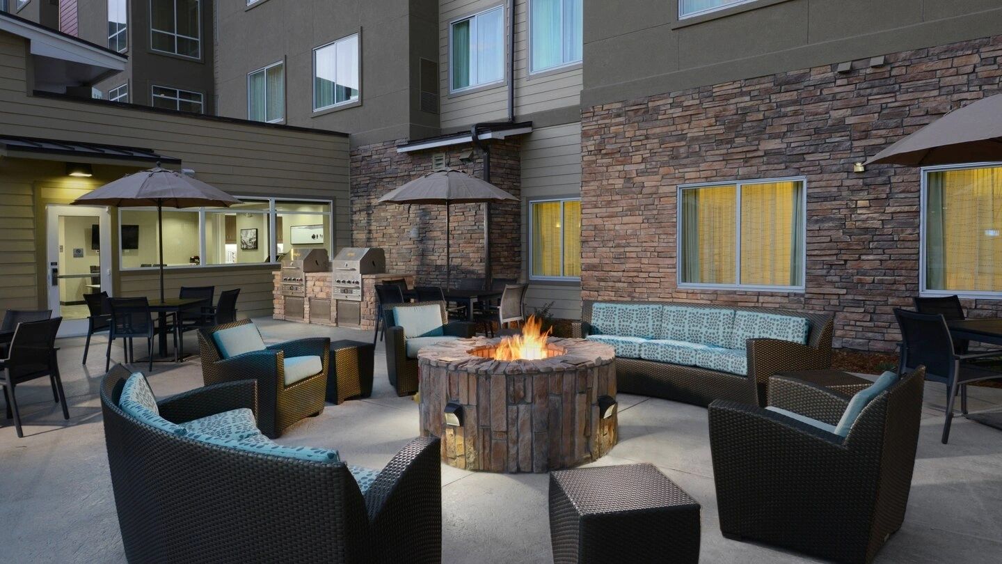 KWB Hotels lobby lounge with warm lighting and stone accents